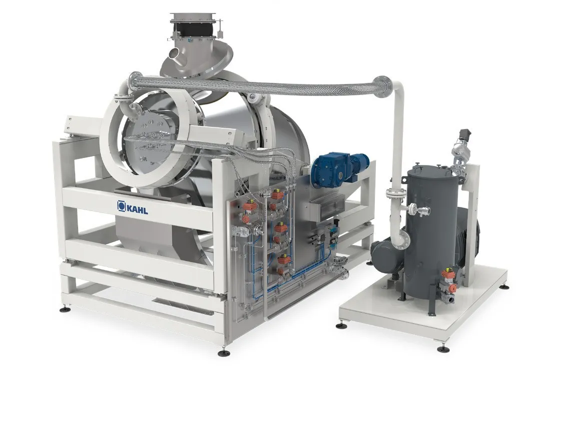 Kahl vacuum coater for applying fat to an extruded product